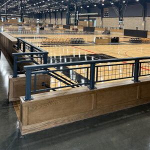 Interior renovation of basketball court with brick and wood architectural details